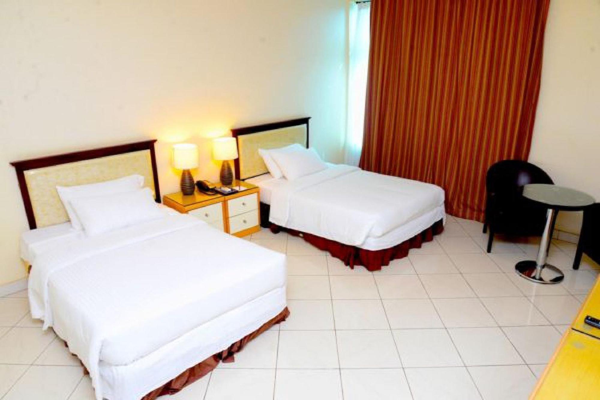 Room In Lodge - Golden Royale Hotel เอนูกู ภายนอก รูปภาพ